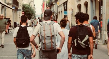 group of people walking on street during daytime