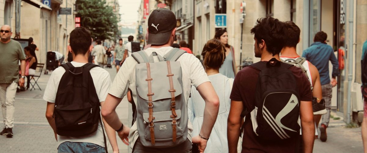 group of people walking on street during daytime